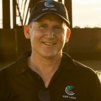 A picture of Aaron Trevis with a description of Founder & CEO, Surf Lakes